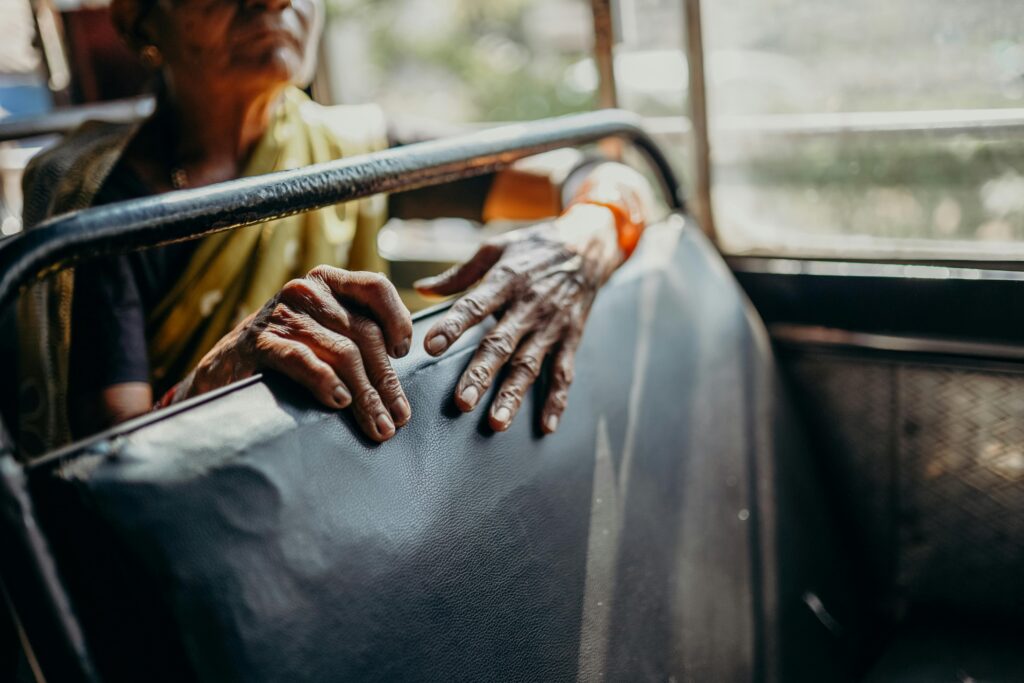 Woman travelling in a city transport bus by Cotton Bro on Pexel 